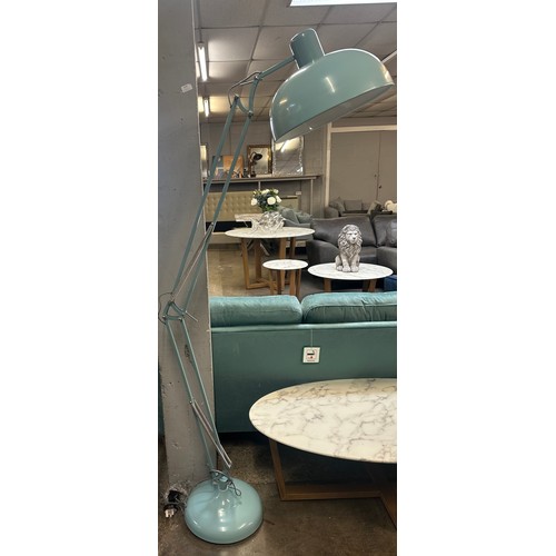 1453 - A powder blue floor standing angle poise lamp