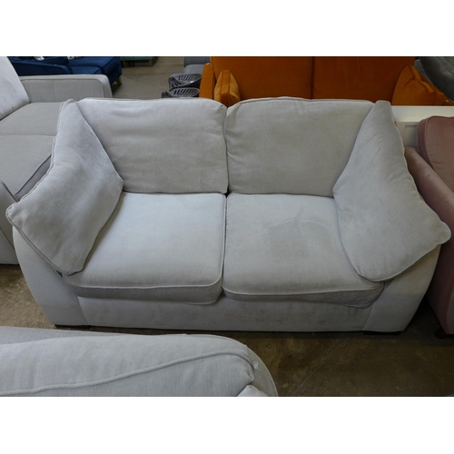 1506 - A Halley cloud white upholstered 2.5 seater sofa - damaged