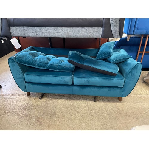 1552 - A teal velvet three seater sofa (damaged) and a small grey two seater sofa (missing cushions)