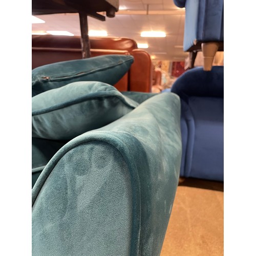 1552 - A teal velvet three seater sofa (damaged) and a small grey two seater sofa (missing cushions)