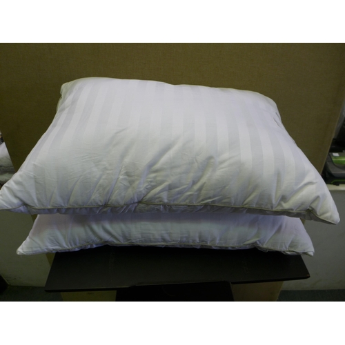 3253 - Two Hotel Grand Down Roll Pillows (290-92) * This lot is subject to VAT