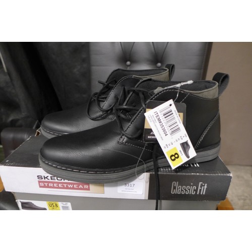 3317 - Pair of Skechers black boots (size UK 7)  *This lot is subject to VAT