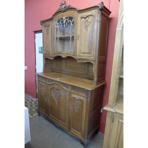 106 - A 19th Century Flemish carved oak Liege side cabinet