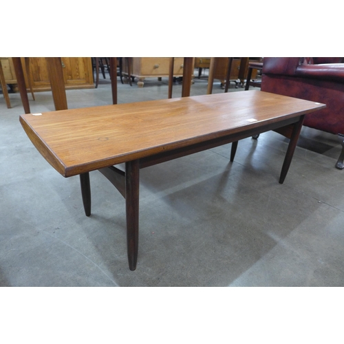 12 - A teak coffee table