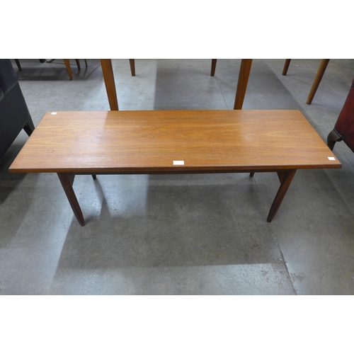 12 - A teak coffee table