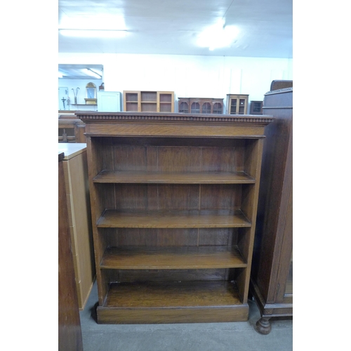 122 - A Victorian oak open bookcase