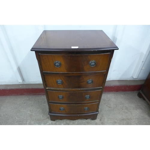 125L - A small inlaid mahogany bow front chest of drawers