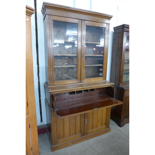 134 - A Victorian oak secretaire bookcase