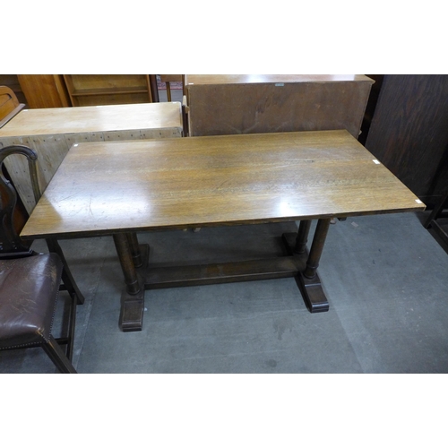 143 - A Heals style oak Churchill refectory table, manner of Philip Tilden