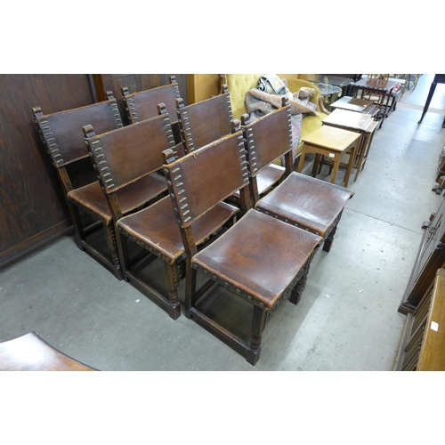 152 - A set of six 17th Century style oak and brown leather dining chairs