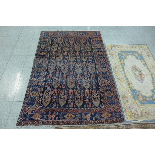 155 - Two eastern rugs and an Aubusson rug