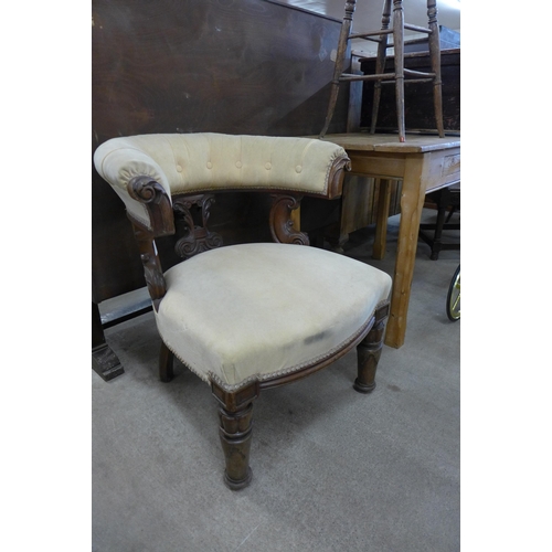 165 - A William IV carved mahogany and fabric upholstered library chair