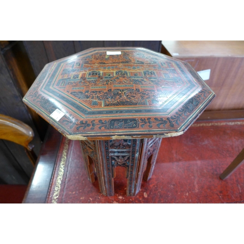 173 - An oriental red lacquered octagonal occasional table and a Victorian circular mahogany two tier occa... 