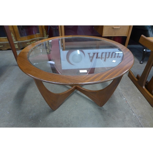 18 - A G-Plan Astro teak and glass topped circular coffee table