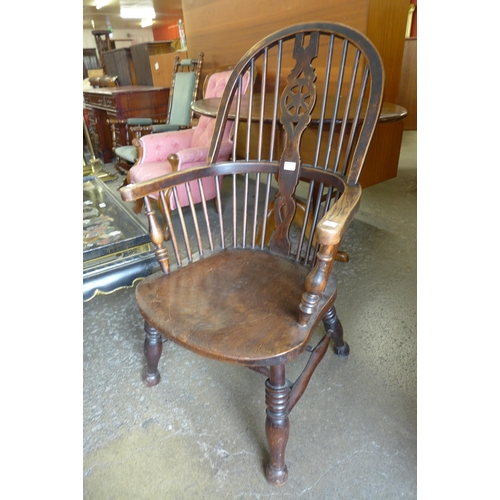 183 - A Victorian beech and elm Windsor chair, stamped Lenister Maker, Wycombe