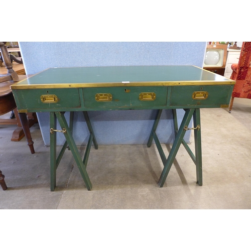 185 - A Victorian style green painted and brass mounted campaign desk