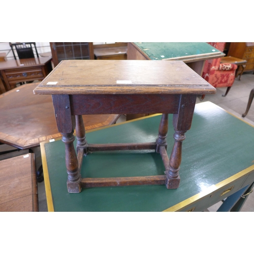 187 - A 17th Century style joint oak stool