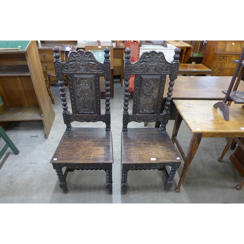 188 - A pair of 19th Century Flemish carved oak side chairs