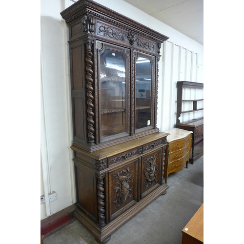 205A - A 19th Century French carved oak bookcase