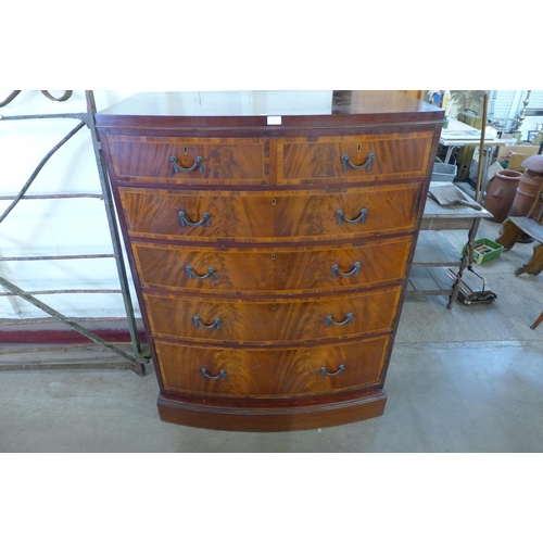 205K - A George IV inlaid mahogany bow front chest of drawers