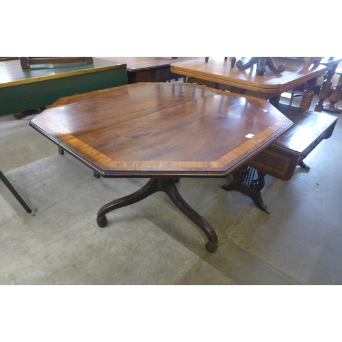 216 - A George IV mahogany octagonal tilt centre table