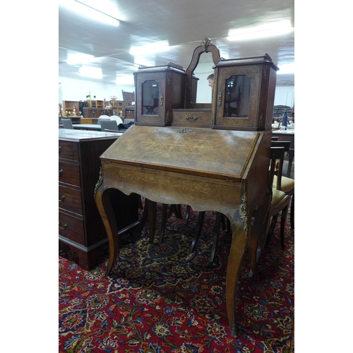 228 - A Victorian inlaid walnut and gilt metal mounted bureau de dame