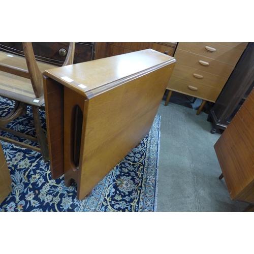 26 - A McIntosh teak drop-leaf table