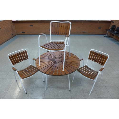 36C - A Danish Daneline teak and white tubular metal garden table and four chairs