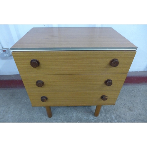 36D - A pair of teak chests of drawers