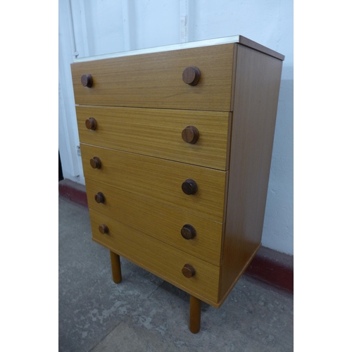 36E - A teak chest of drawers