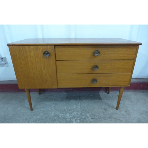 36H - A small teak sideboard