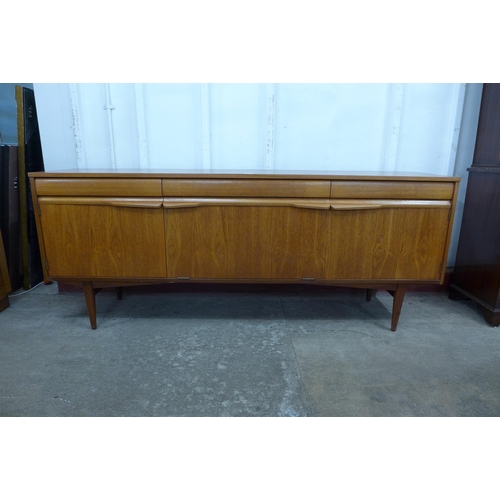 36L - A teak sideboard