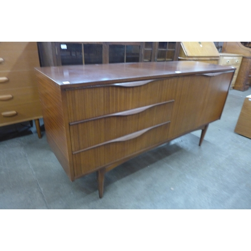 41 - An Elliots of Newbury tola wood sideboard