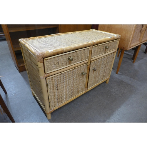 44 - A small Italian bamboo and rattan cabinet