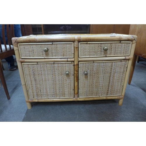 44 - A small Italian bamboo and rattan cabinet