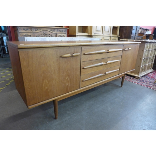 49 - A teak sideboard