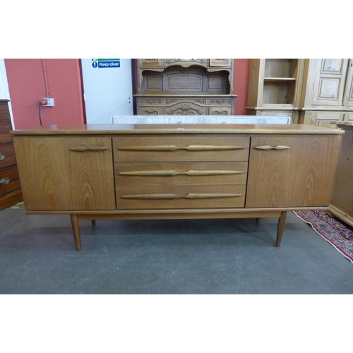 49 - A teak sideboard