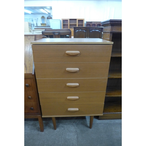 57 - A teak chest of drawers