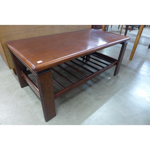 63 - A simulated rosewood coffee table