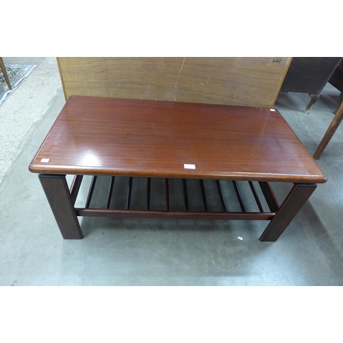 63 - A simulated rosewood coffee table