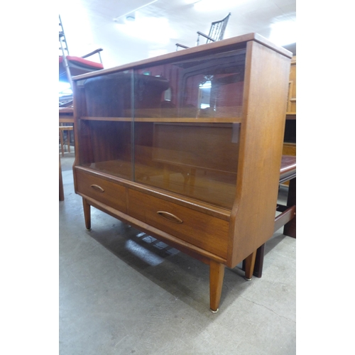 64 - A Jentique teak bookcase