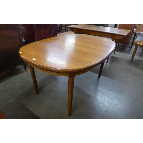 68 - A McIntosh teak extending dining table