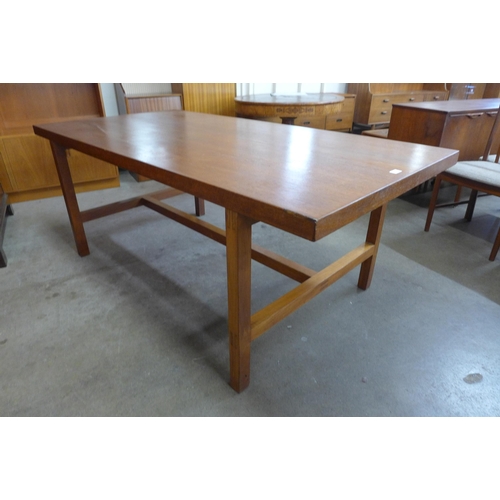 76 - A Staverton teak dining table