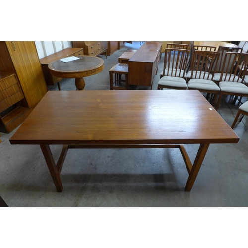 76 - A Staverton teak dining table