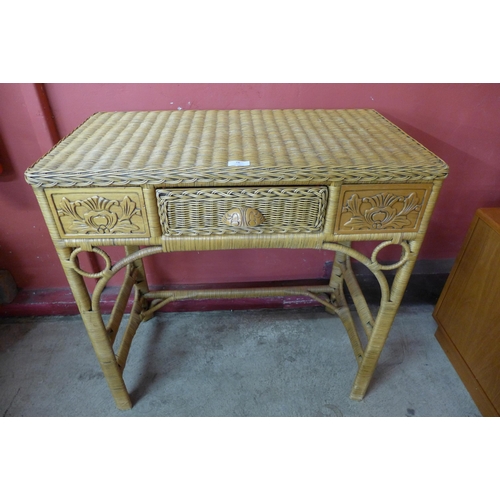 78 - A beech and wicker single drawer desk