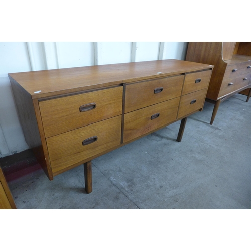 81 - A small teak six drawer sideboard