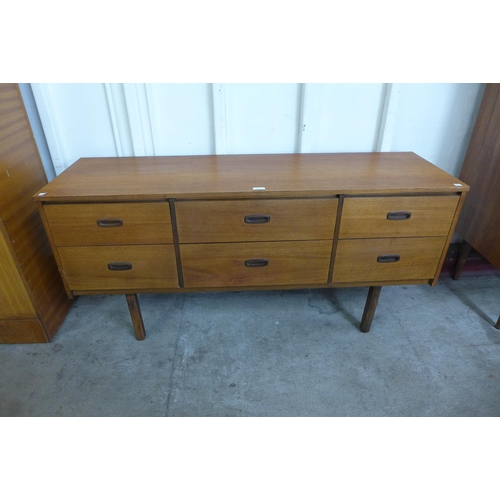 81 - A small teak six drawer sideboard