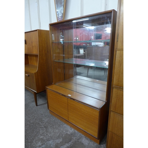 83 - A Tunbridge of London teak display cabinet