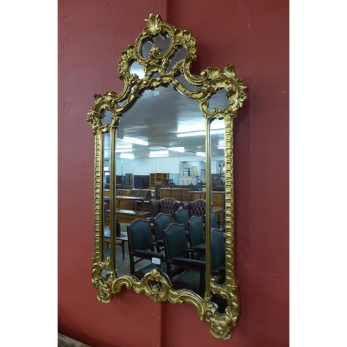 89 - A Rococo style gilt framed mirror