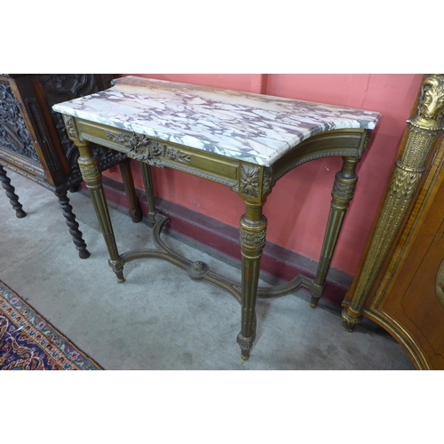 91 - A French Louis XIV style carved gilt and marble topped console table